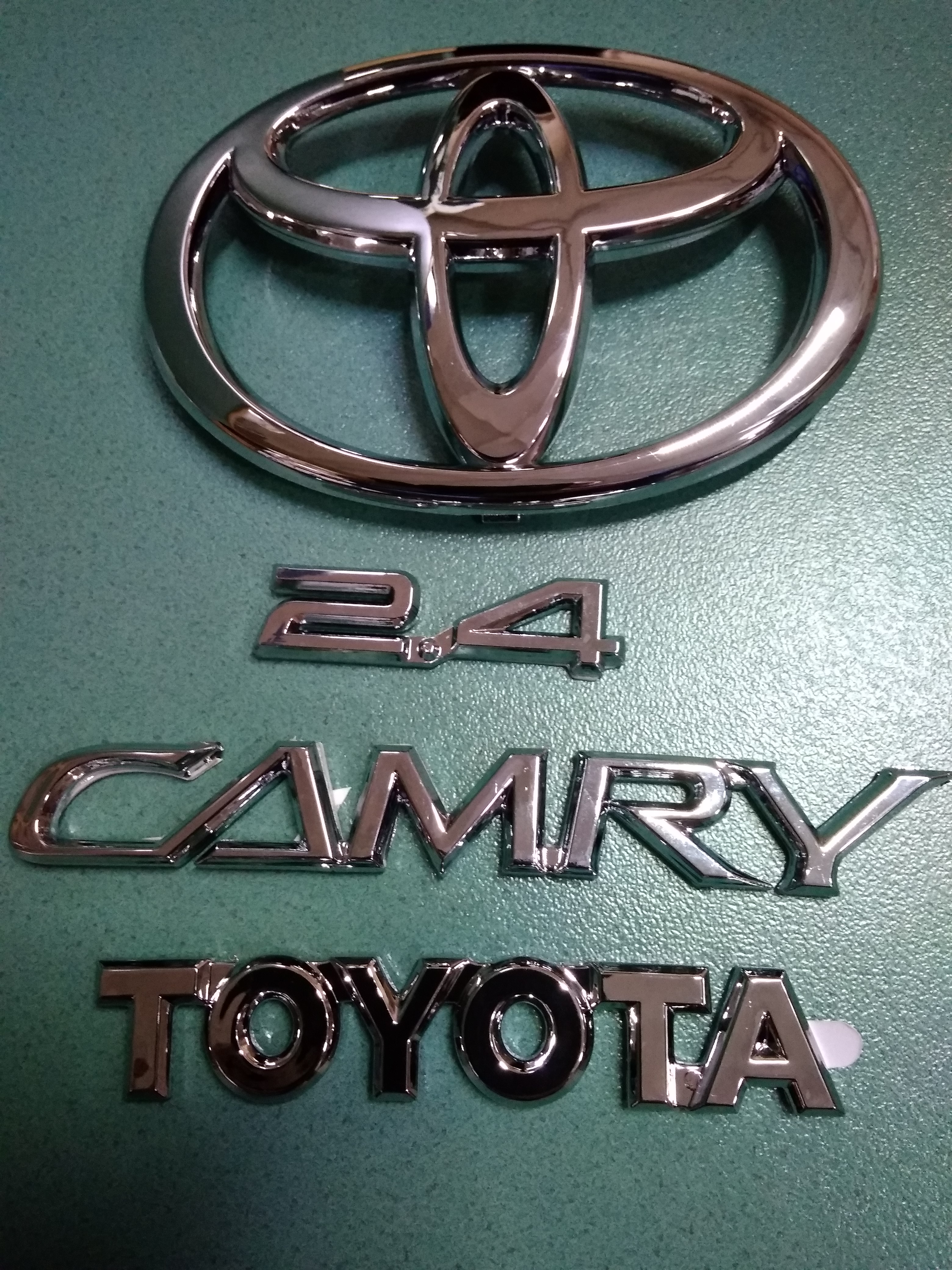 Тойота Камри значок логотип